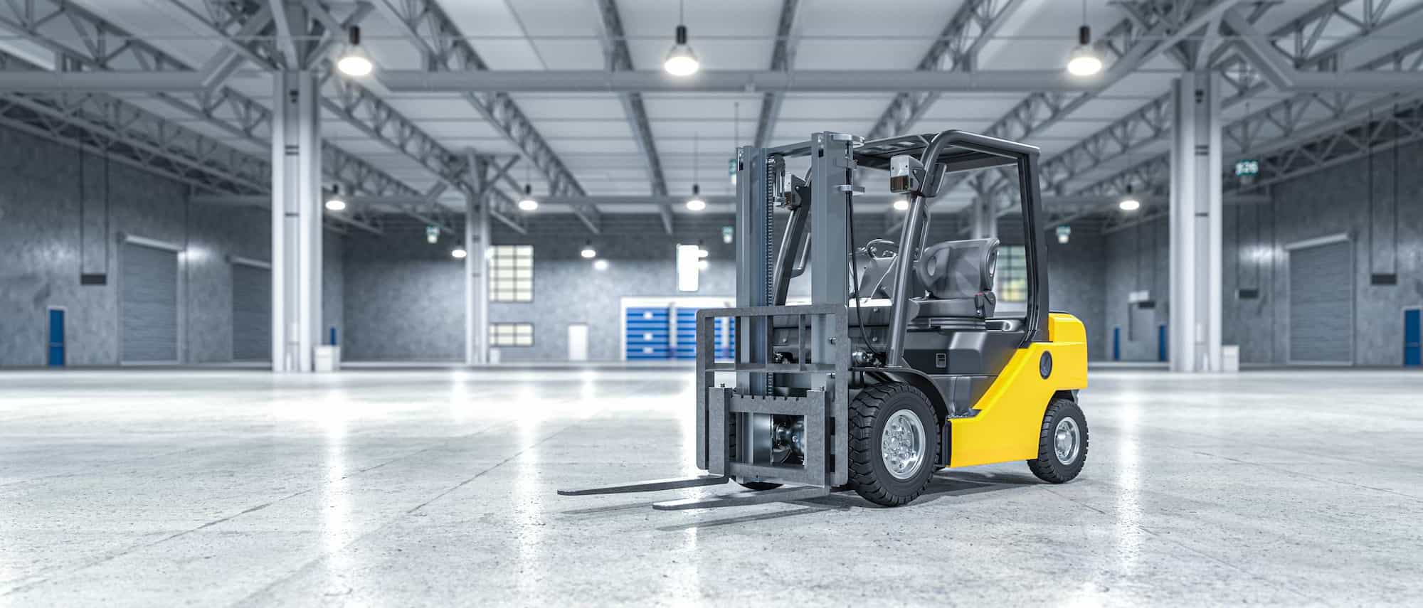 Skid Steer in empty warehouse